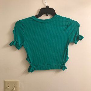 Green crop top with cutouts